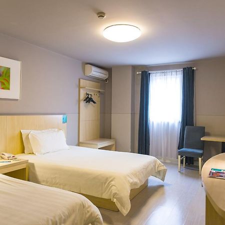 Jingjiang Inn Shanghai Minsheng Road Экстерьер фото